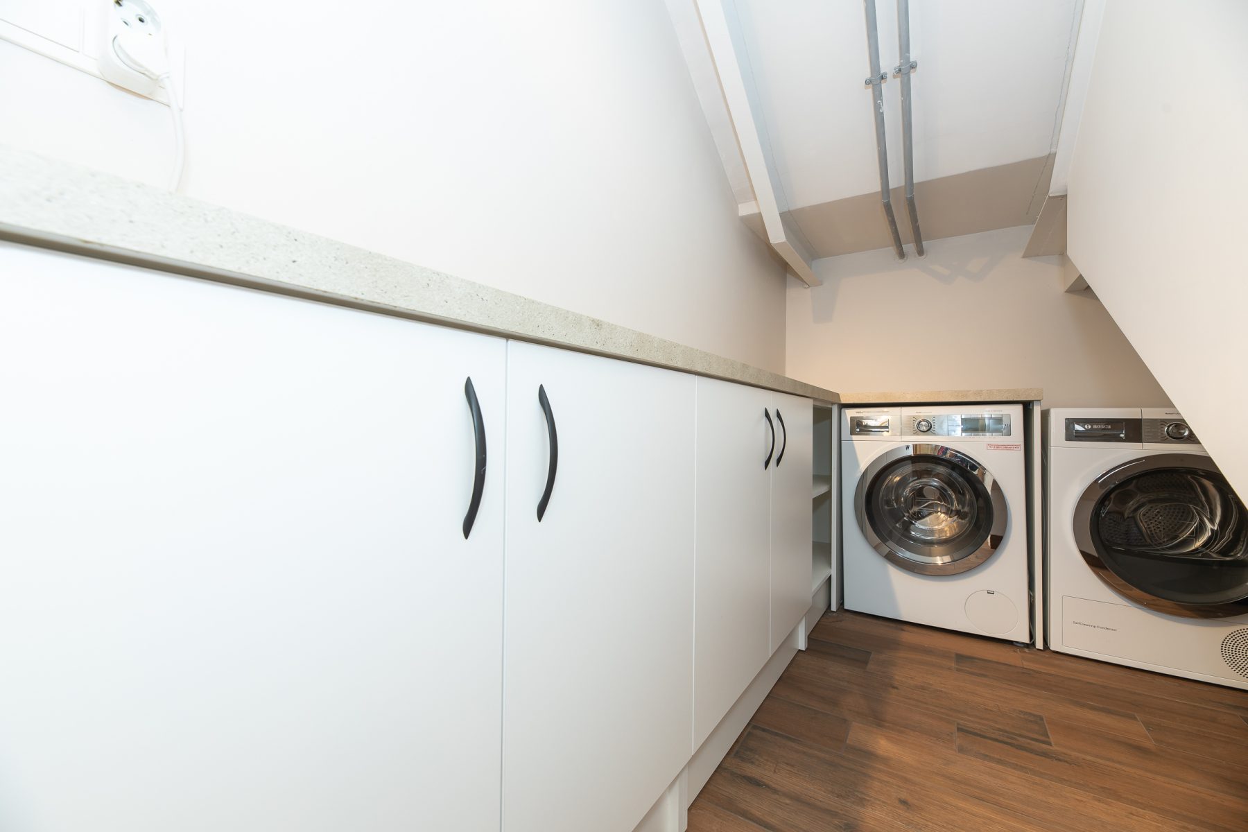 Dviejų aukštų butas su skalbykla