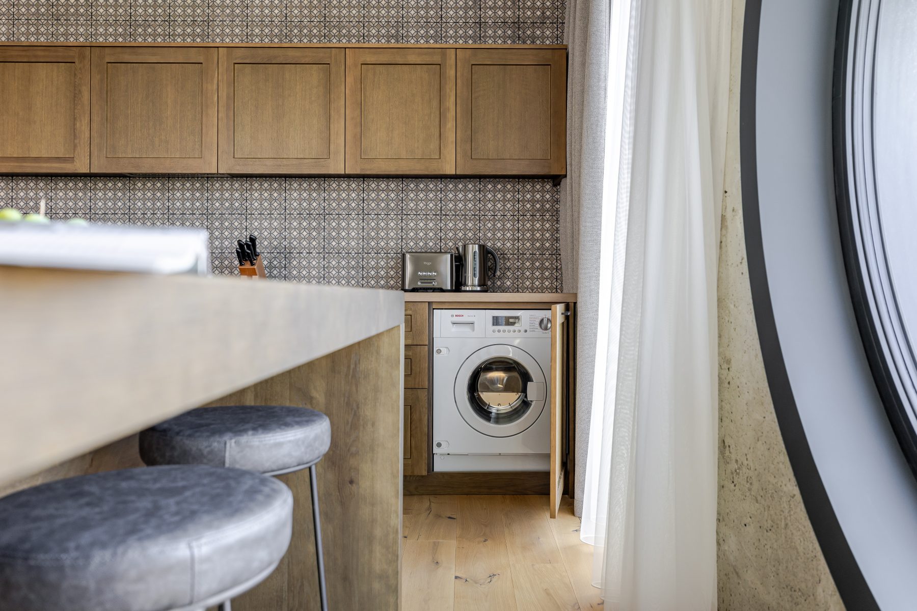 Virtuvėje integruota balduose skalbyklė