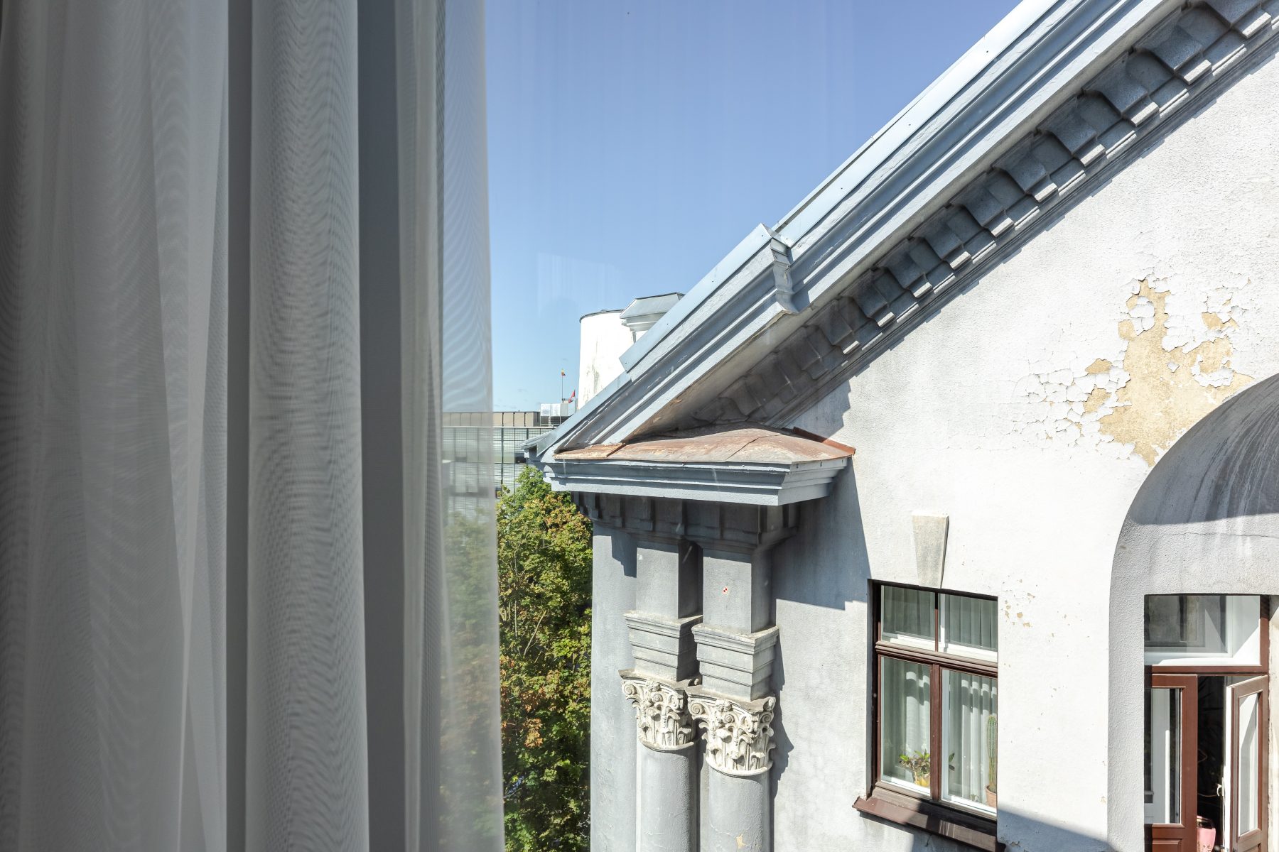 Išskiriniai Kauno architektūros vaizdai per didelius langus